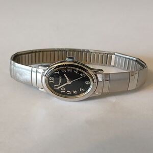 Vintage Timex Black Oval Dial Stainless Steel Silver Tone Analog Bracelet Watch